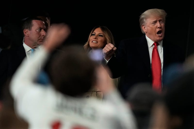 Former President Donald Trump and his wife Melania arrive for Game 4 of baseball's World Series between the Houston Astros and the Atlanta Braves Saturday, Oct. 30, 2021, in Atlanta.