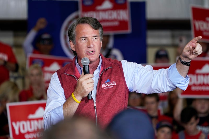 Republican gubernatorial candidate Glenn Youngkin gestures as he speaks to supporters during a rally in Chesterfield, Va., Monday, Nov. 1, 2021. Youngkin will face Democrat former Gov. Terry McAuliffe in the November election.