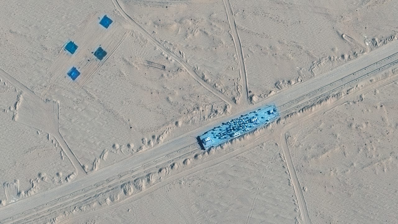 Satellite images show China built mock-ups of U.S. warships