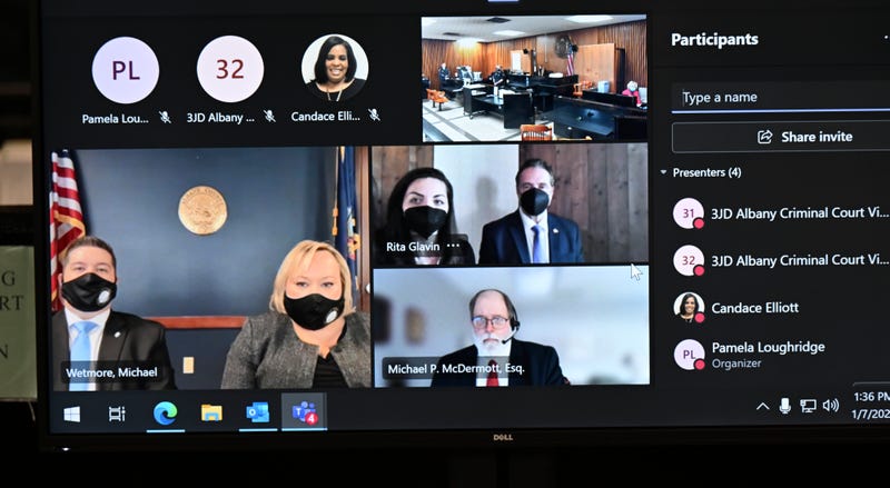 Former New York Gov. Andrew Cuomo appears briefly virtually for a court session in Albany City Court before Judge Holly Trexler, as she considers a prosecutor's request to dismiss a fondling case against him Friday, Jan. 7, 2022, in Albany, N.Y
