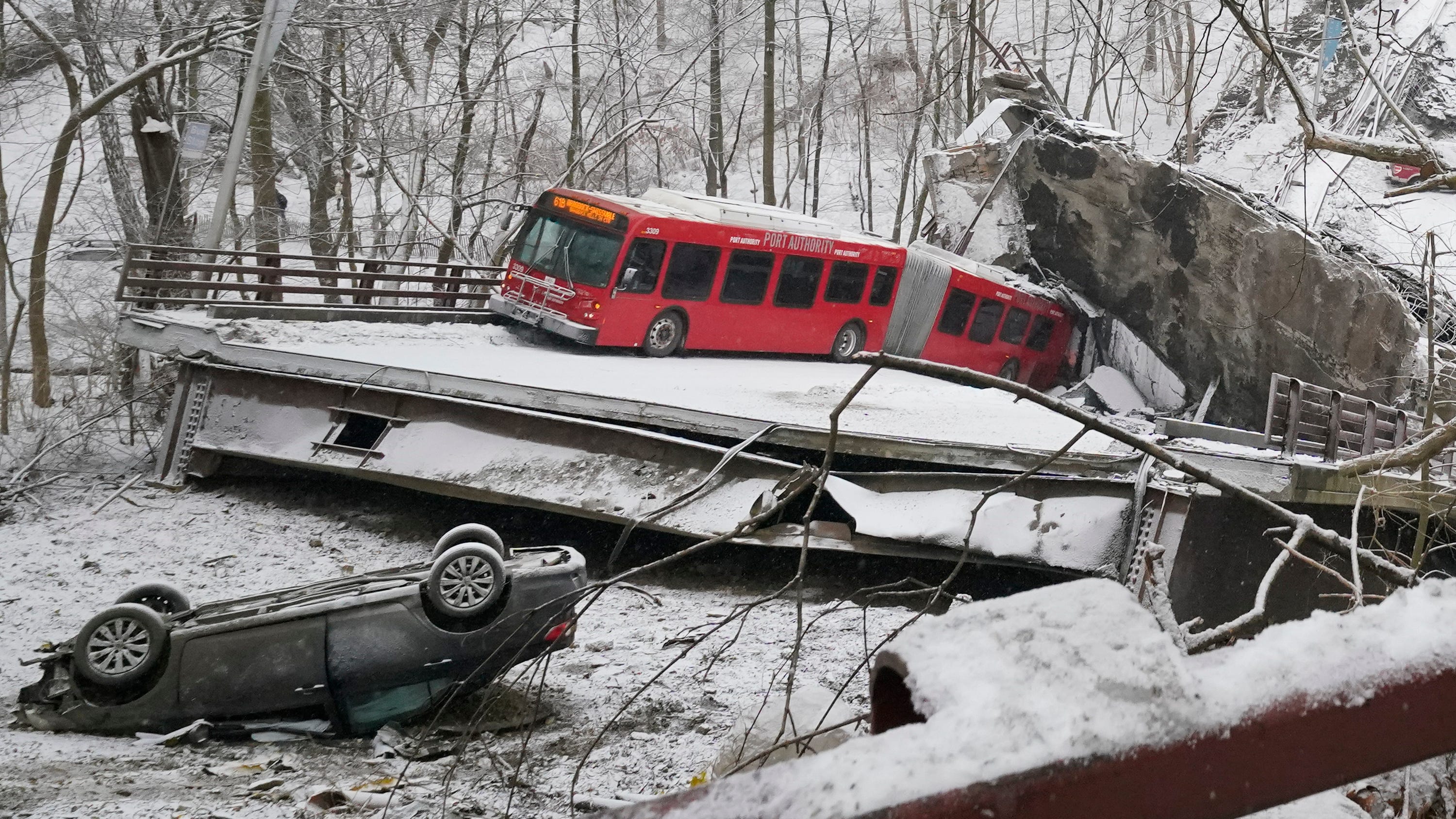 Bridge collapses in Pittsburgh, human chain used to rescue those trapped