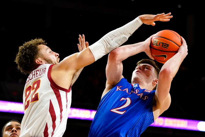Kansas guard Christian Braun (2) shoots over Iowa State guard Gabe Kalscheur (22)