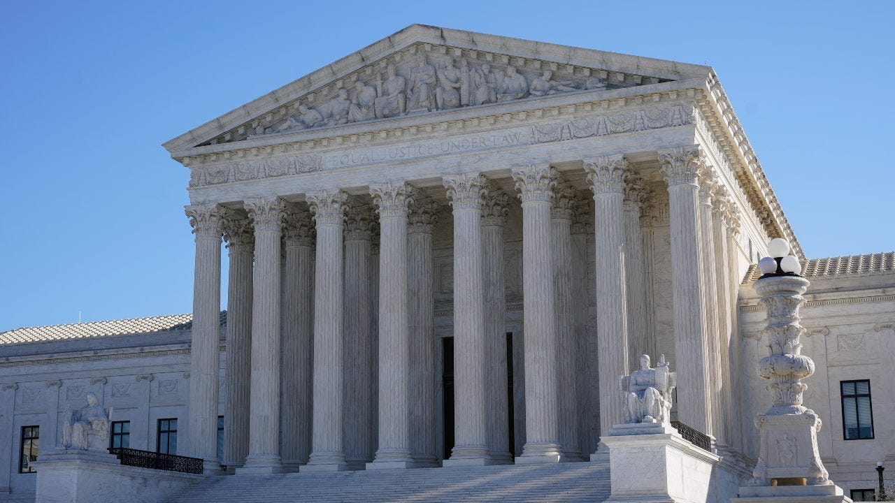 High court gives Biden win for now in Navy vaccine case