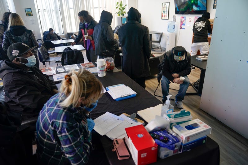 People rest and take advantage of services at the overdose prevention center at OnPoint NYC in New York, N.Y., Friday, Feb. 18, 2022