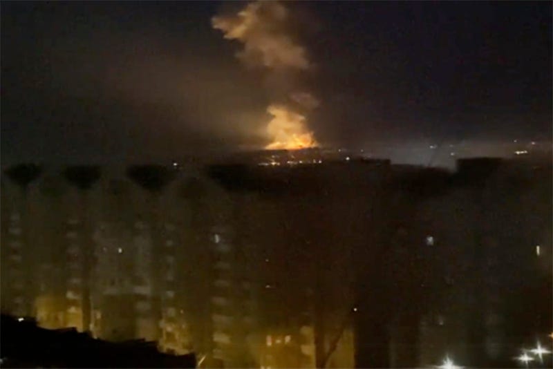 A flame is seen from an area near the Dnieper river in Kyiv, Ukraine, Thursday, Feb. 24, 2022