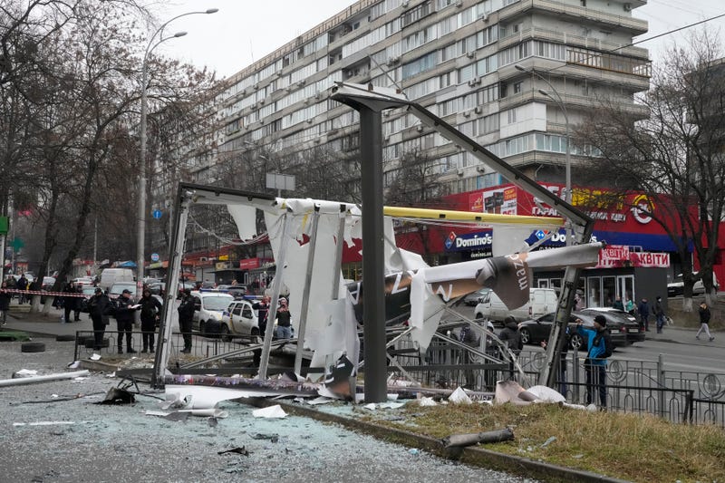 Police investigate the consequences of Russian shelling in Kyiv, Ukraine, Thursday, Feb. 24, 2022
