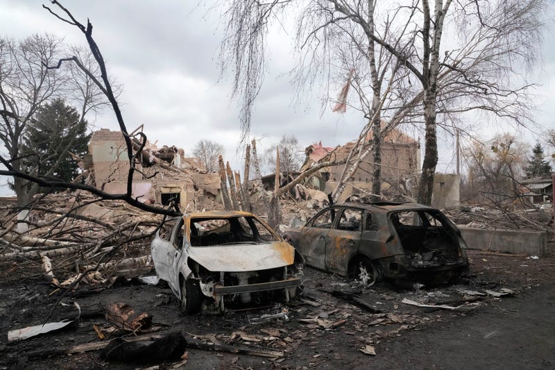 Gutted cars following a night air raid in the village of Bushiv, 40 kilometers west of Kyiv, Ukraine, Friday, March 4, 2022