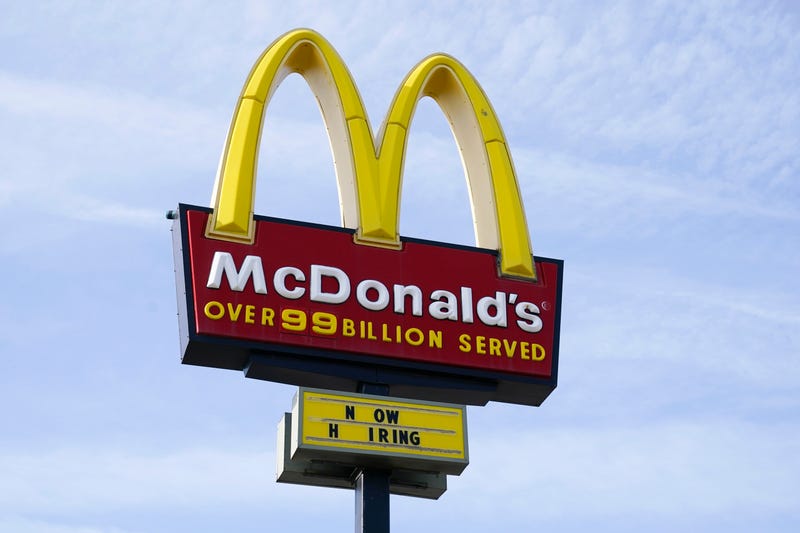 FILE - A sign is displayed outside a McDonald's restaurant, Tuesday, April 27, 2021, in Des Moines, Iowa. McDonald’s said Tuesday, March 8, 2022, it is temporarily closing all of its 850 restaurants in Russia in response to the country's invasion of Ukraine. The burger giant said it will continue paying its 62,000 employees in Russia.