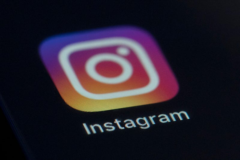 FILE - This photo shows the Instagram app icon on the screen of a mobile device on Aug. 23, 2019. Russian regulators said Friday, March 11, 2022, that internet users in the country will be blocked from accessing Instagram because it's being used to call for violence against Russian soldiers, in Moscow's latest move to tighten up access to foreign social platforms.  