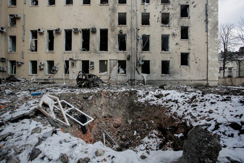 A view of a bomb crater after Russian shelling in the central of Kharkiv, Ukraine, Wednesday, March 16, 2022