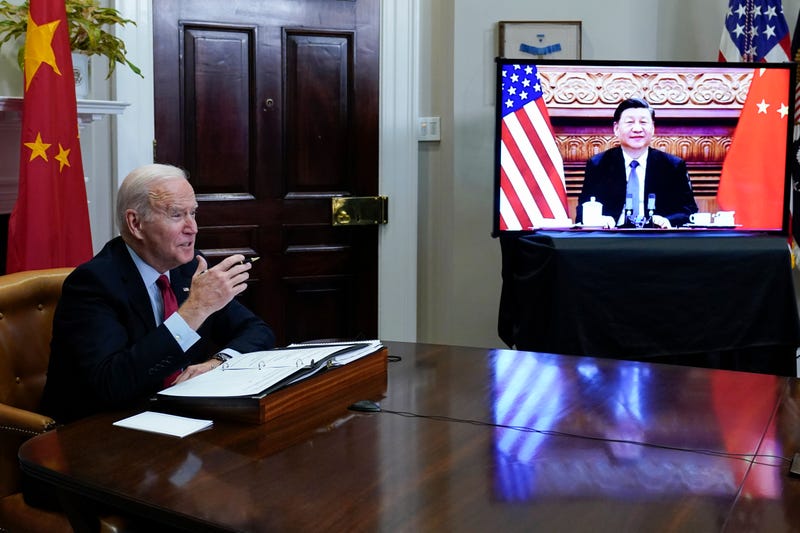 FILE - President Joe Biden meets virtually with Chinese President Xi Jinping from the Roosevelt Room of the White House in Washington, on Nov. 15, 2021.