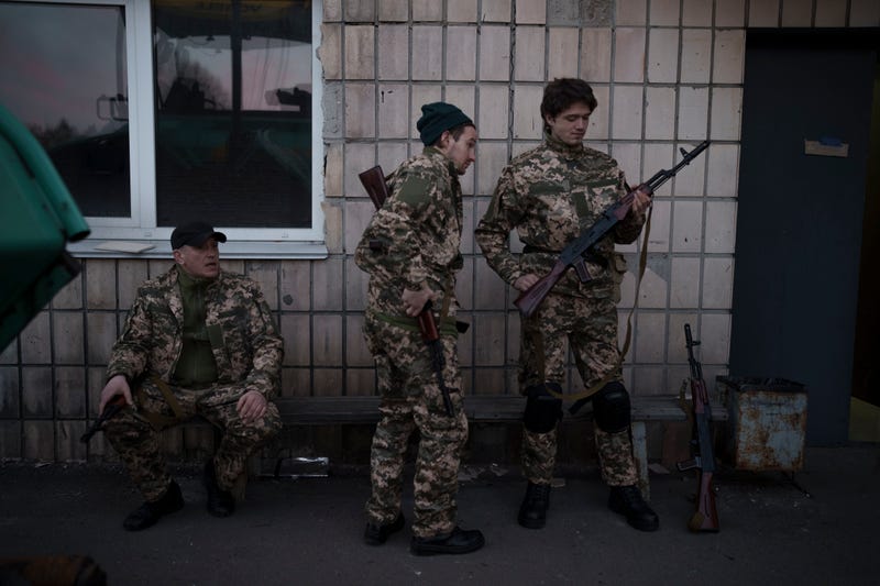 Civilian volunteers attend a training camp of the Ukrainian Territorial Defense Forces in Brovary, northeast of Kyiv, Ukraine, Monday, March 21, 2022