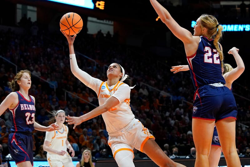 Tennessee's Rae Burrell, center, puts up a shot between Belmont's Nikki Baird (23) and Tessa Miller (22)