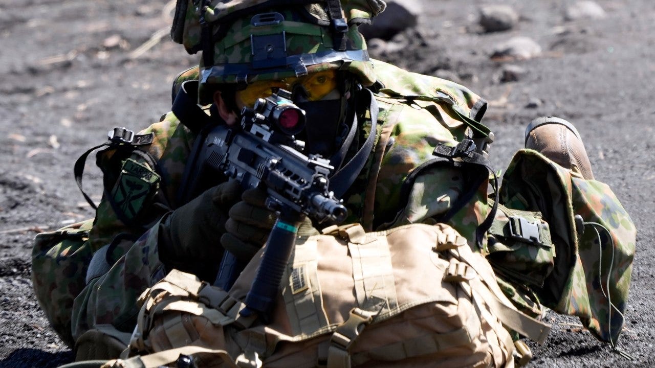 Japan OKs bigger budget to host U.S. forces, step up alliance
