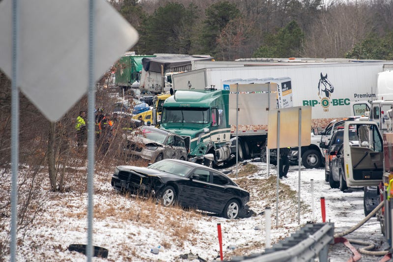 Cars are piled up on and off the road following a multi-vehicle crash on Interstate 81 North near the Minersville exit in Foster Township, Pa., March 28, 2022.