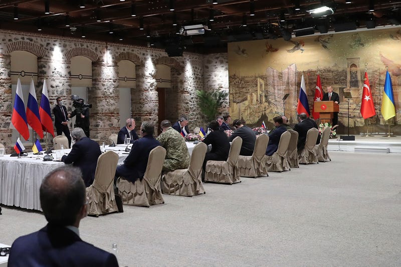 In this photo provided by Turkish Presidency, Turkish President Recep Tayyip Erdogan, right, gives a speech to welcome the Russian and Ukrainian delegations ahead of their talks, in Istanbul, Turkey, Tuesday, March 29, 2022