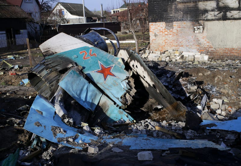 Fragments of a Russian jet fighter on a private house in Chernihiv, Ukraine, Wednesday, April 6, 2022