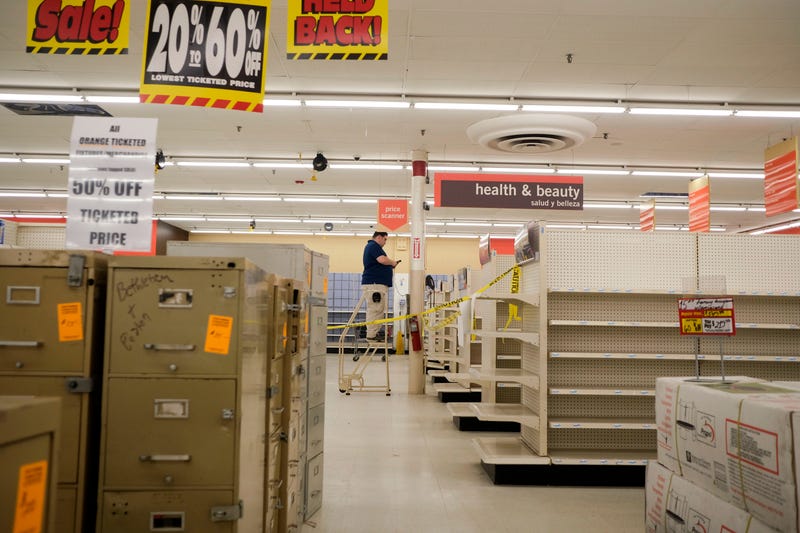 FILE - While many shelves are empty, furniture and fixtures are on still on sale at the Kmart in Avenel, N.J., Monday, April 4, 2022. When the Kmart in Avenel closes its doors on April 16, it will leave only three remaining U.S. locations for the former retail powerhouse. It's a far cry from the chain's heyday in the 1980s and ‘90s when it had more than 2,000 stores and sold product lines endorsed by Martha Stewart and former “Charlie's Angel” Jaclyn Smith. 