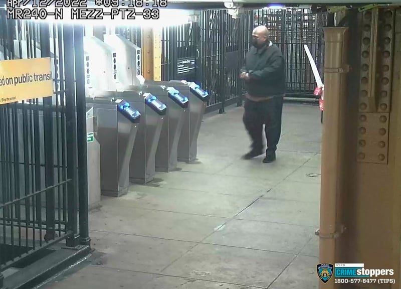 This image provided by NYPD on Wednesday, April 13, 2022, shows suspected subway shooter Frank R. James, 62, leaving a subway station after his attack on a subway train Tuesday
