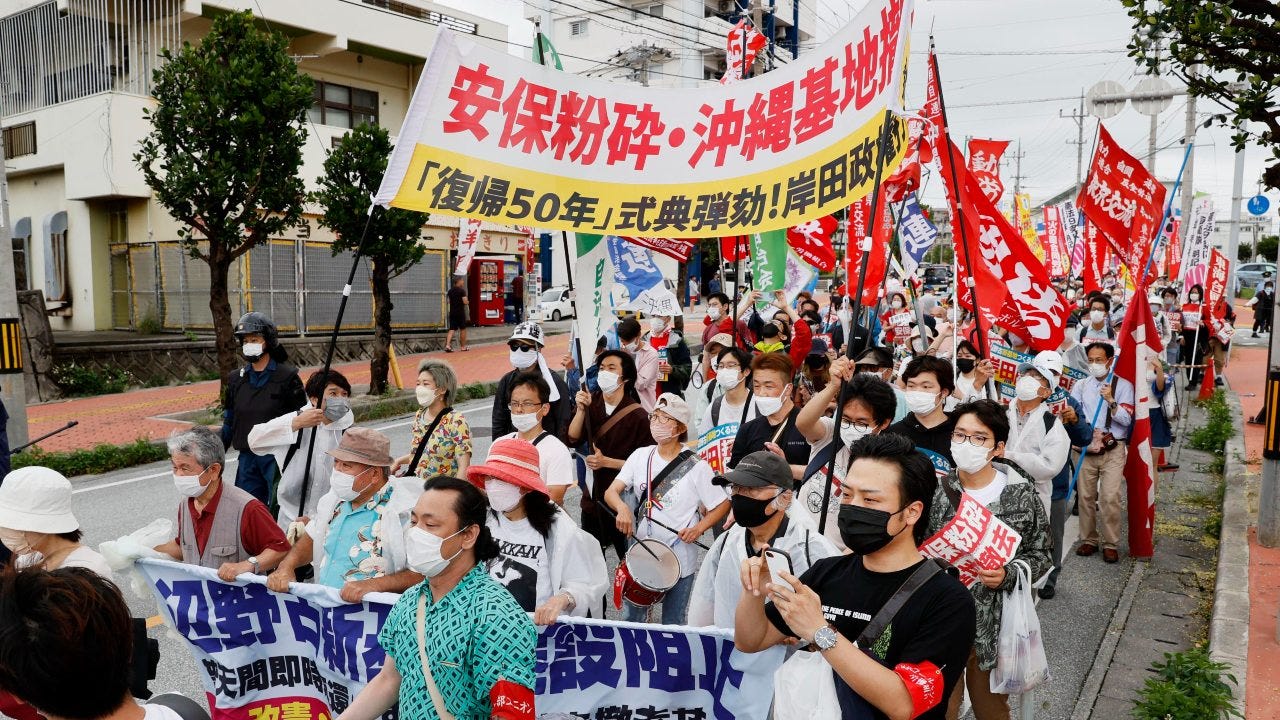 Okinawa marks 50 years of end to US rule amid protests