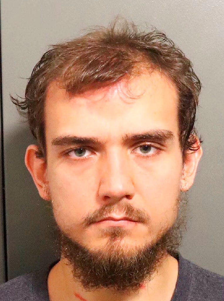 This undated photo provided by the Douglas County Sheriff's Office in Lawrence, Kan., shows Chad Joseph Marek.