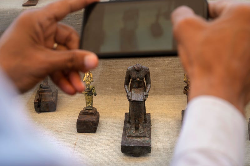 headless bronze statue of Imhotep