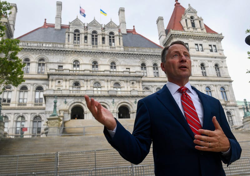Republican candidate for New York Governor Rob Astorino speaks to a reporter about gun laws and election issues outside the state Capitol on the last scheduled day of the 2022 legislative session, Thursday, June 2, 2022, in Albany, N.Y