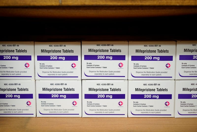 Boxes of the drug mifepristone line a shelf