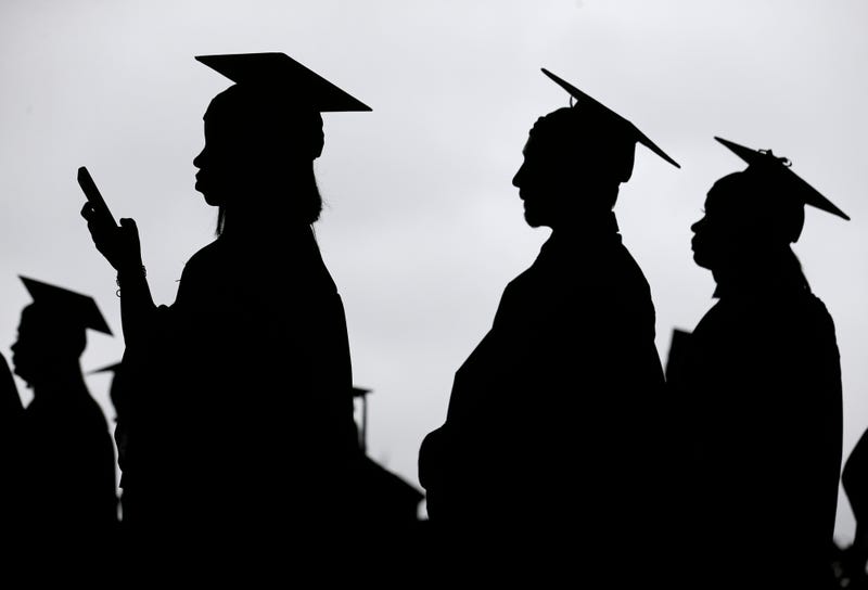 New graduates line up
