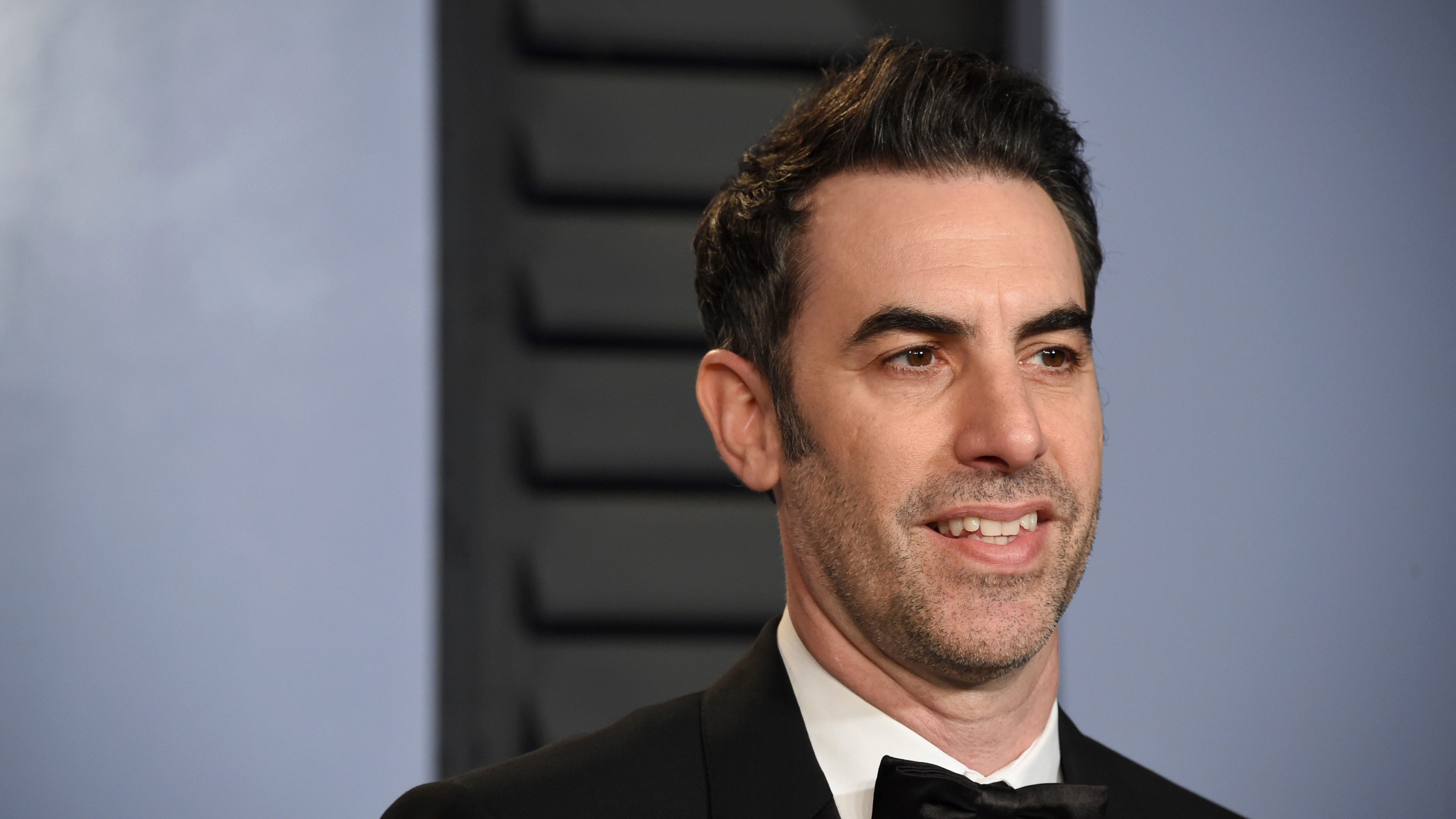 Sacha Baron Cohen avoids Roy Moore's defamation suit