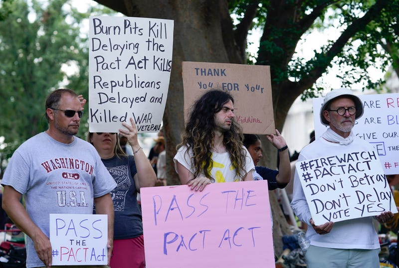 Veterans, military family members and advocates rally outside the Capitol in Washington, Tuesday, Aug. 2, 2022, in support of a bill that enhances health care and disability benefits for millions of veterans exposed to the toxic burn pits.
