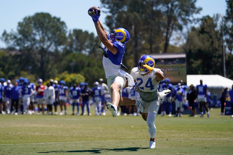 Los Angeles Rams wide receiver Cooper Kupp, left, and Los Angeles Rams defensive back Taylor Rapp (24) participate in a drill during NFL football training camp in Irvine, Calif., Saturday, Aug. 6, 2022.