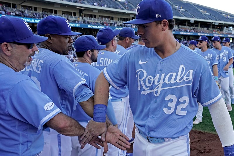 Kansas City Royals' Nick Pratto (32) celebrates with teammates after the first game of a baseball doubleheader against the Chicago White Sox