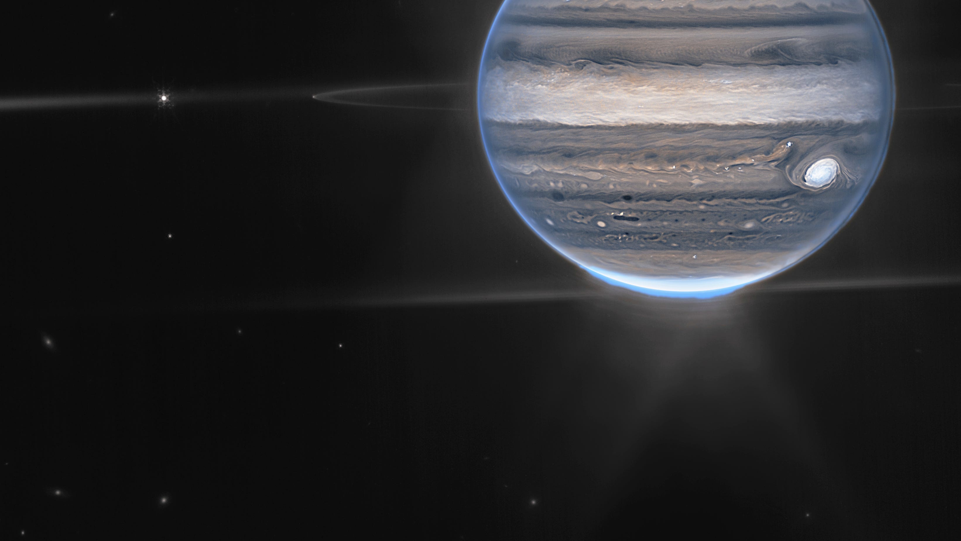 New space telescope shows Jupiter's auroras, tiny moons