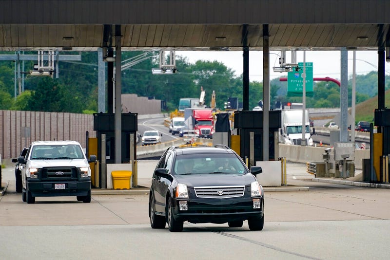 Traffic going eastbound on the Pennsylvania Turnpike proceeds through the electronic toll booths in Cranberry Township, Pa.