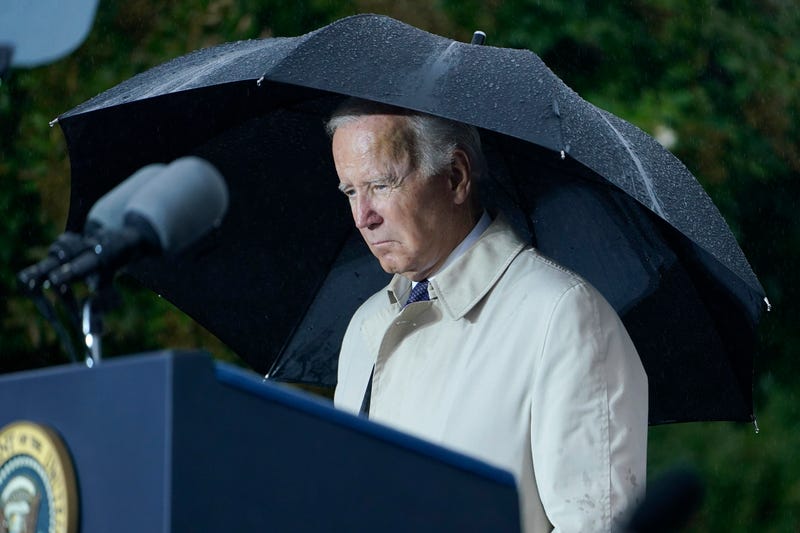 President Joe Biden stands during a moment of silence during a ceremony at the Pentagon in Washington, Sunday, Sept. 11, 2022, to honor and remember the victims of the September 11th terror attack. 
