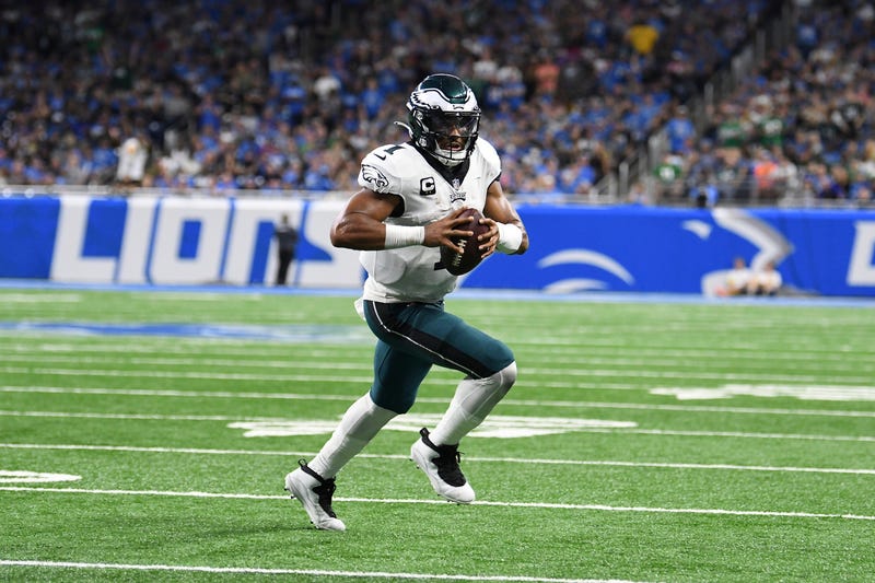 Philadelphia Eagles quarterback Jalen Hurts (1) runs the ball against the Detroit Lions in the first half of an NFL football game in Detroit, Sunday, Sept. 11, 2022. 