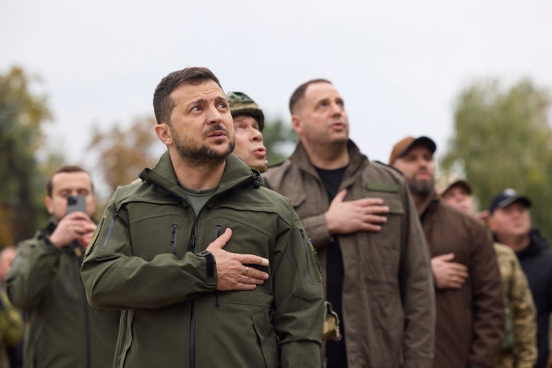 Ukrainian flag raised in retaken city after Russian retreat