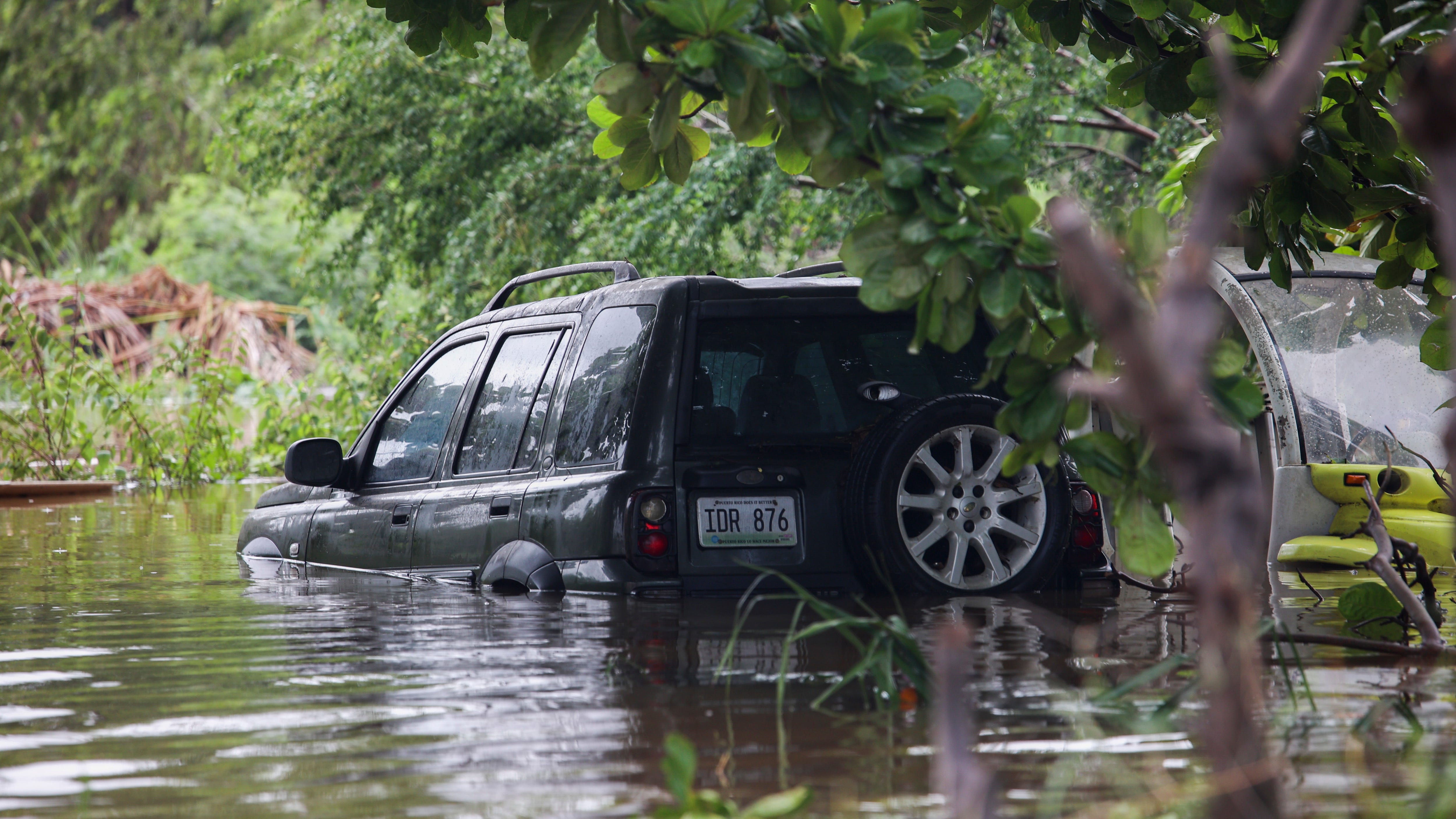 Fiona dumps more rain on Puerto Rico; troops rescue hundreds