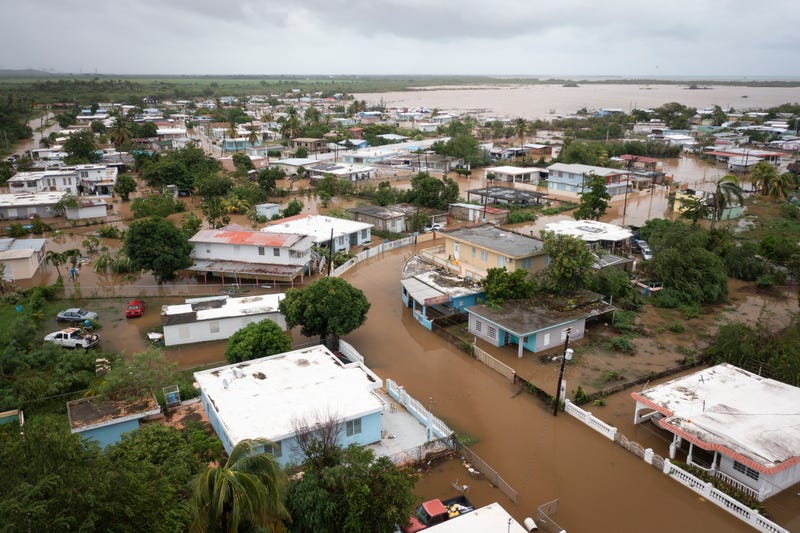 Fiona dumps more rain on Puerto Rico; troops rescue hundreds