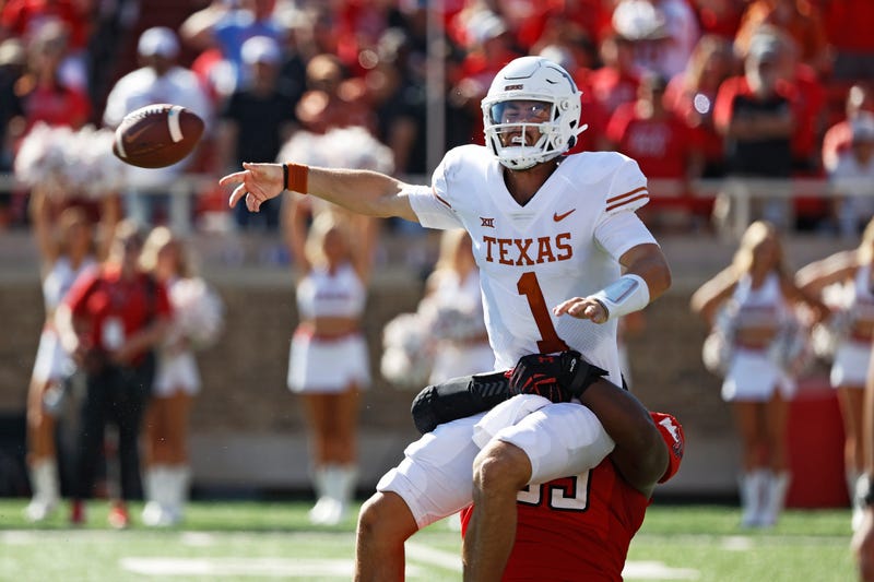 Texas Tech's Jaylon Hutchings (95) sacks Texas' Hudson Card (1) during the second half of an NCAA college football game Saturday, Sept. 24, 2022, in Lubbock, Texas.