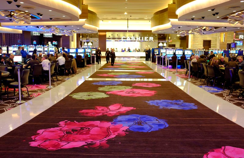 FILE - People gamble inside Graton Resort and Casino in Rohnert Park, Calif., Oct. 29, 2013. The campaign that could bring legalized sports betting to California has become the most expensive ballot initiative fight in state history. Two rival proposals are pitting wealthy Native American tribes against FanDuel, DraftKings and other online gambling companies, in a contest over what could become the nation's most lucrative marketplace.