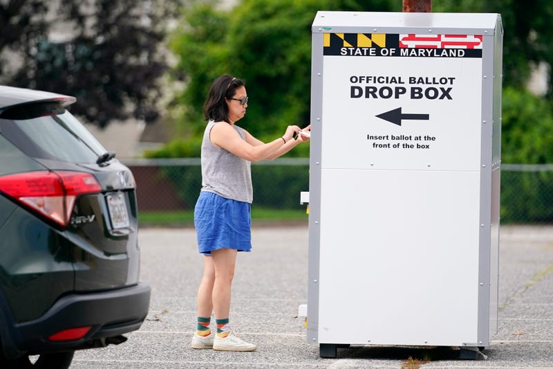 How are mail-in and absentee ballots verified?
