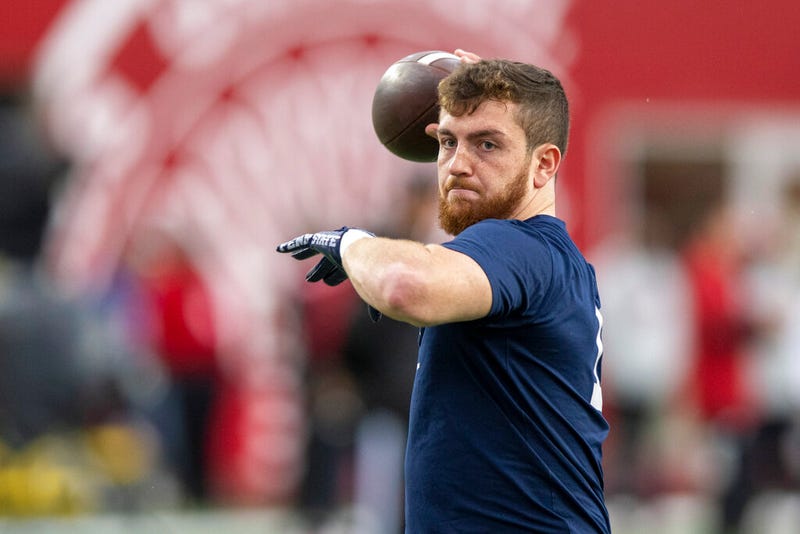 Penn State quarterback Sean Clifford (14) warms up before an NCAA college football game against Indiana, Saturday, Nov. 5, 2022, in Bloomington, Ind. (AP Photo/Doug McSchooler)