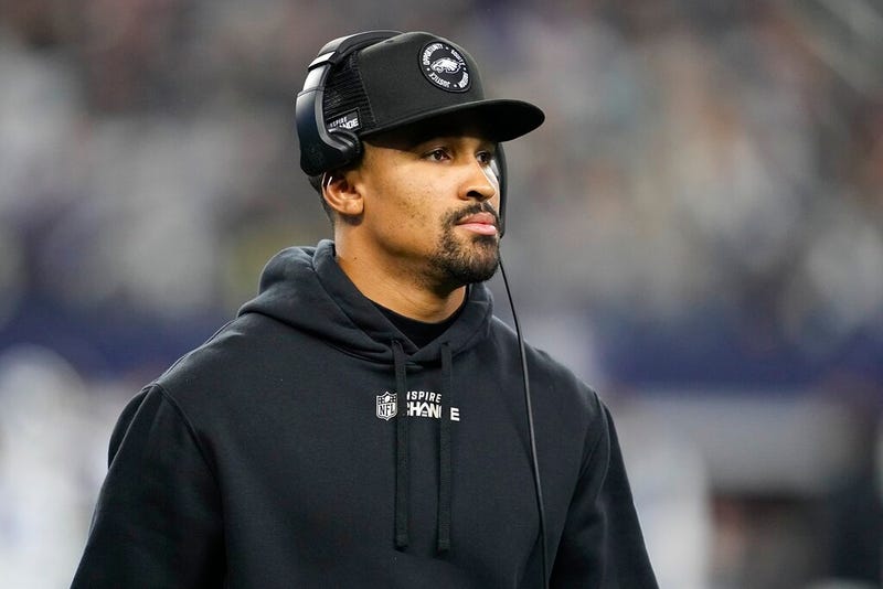 Philadelphia Eagles' Jalen Hurts is seen on the sideline during the second half of an NFL football game against the Dallas Cowboys Saturday, Dec. 24, 2022, in Arlington, Texas