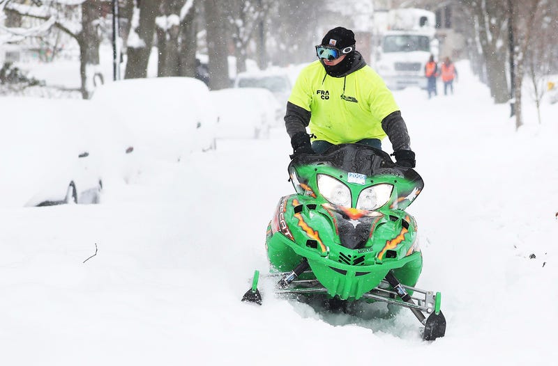 Snowmobile operator making his way to Home Depot so he could buy a shovel