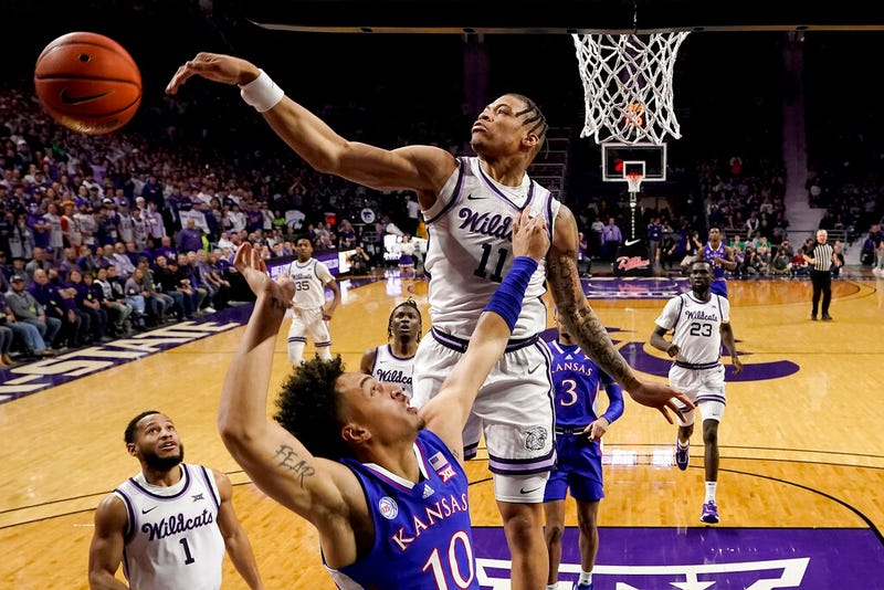 Kansas State forward Keyontae Johnson (11) blocks a shot by Kansas forward Jalen Wilson (10)