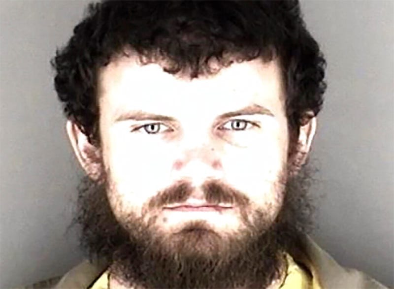 Booking photo provided by the Shawnee County, Kan., jail shows Chase Neill.