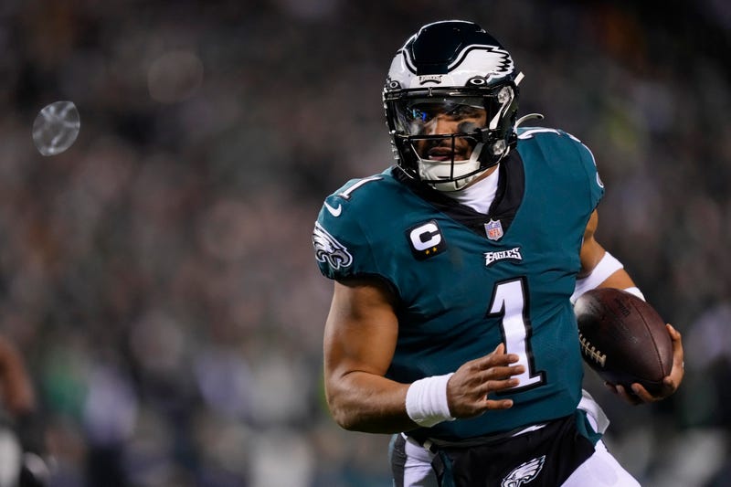 Philadelphia Eagles quarterback Jalen Hurts runs for a touchdown against the New York Giants during the first half of an NFL divisional round playoff football game, Jan. 21, 2023, in Philadelphia. 