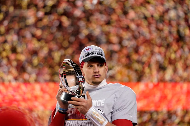 Kansas City Chiefs quarterback Patrick Mahomes holds the Lamar Hunt Trophy after the NFL AFC Championship playoff football game against the Cincinnati Bengals, Sunday, Jan. 29, 2023, in Kansas City, Mo. The Chiefs won 23-20.